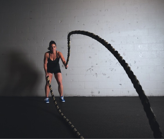 woman doing soprt with a rope 